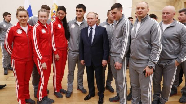 Владимир Ппутин и спортсмены, которые будут участвовать в Олимпиаде