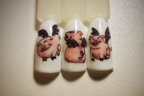 Новогодний маникюр 2019 фото: дизайн ногтей на Новый год желтой свиньи