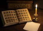 Открытая книга святцев на деревянном столе